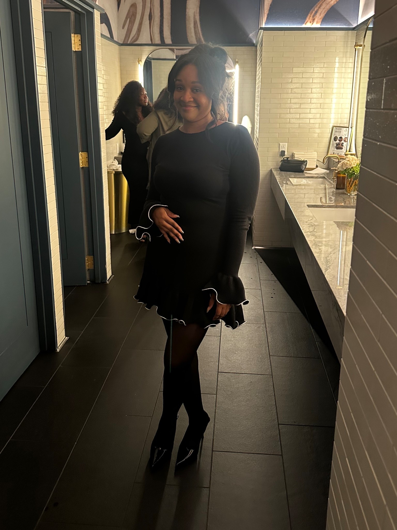 ✨ Ruffle Mini Moment — A flirty, feminine black dress with soft ruffle details and a fitted silhouette that gives effortless polish for birthday dinners, holiday parties, or any night you want to feel a little elevated. The movement of the hem and sleeves makes this one an instant statement-maker.

Perfect for birthdays, dinner plans, and festive holiday events.

📏 Sizing: Wearing a medium in the dress, sheer tights in a large, and pumps in a size 8.

Keywords: black ruffle dress outfit, birthday dinner outfit, holiday party look, chic night-out style, winter event outfit, little black dress inspo, sheer tights outfit ideas, classic black pumps look

Follow me on Instagram: @kandyle.renee

#LTKParties #LTKOver40 #LTKHoliday