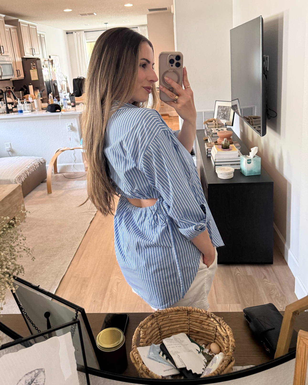 Love the peek a boo back on this button down shirt!

#LTKMothersDay #LTKgrwm #LTKootd