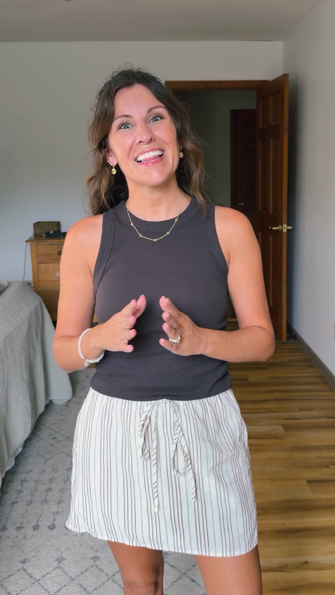 Easy mom outfit🤎 This skirt with built in shorts is soooo cute! Comes in a couple other colors too.

Small in my bra, small in my tank and xs in my skirt/skort. My sandals are size 36.

Im 5’1” and around 100lbs for reference

#LTKPetite #LTKSeasonal #LTKootd