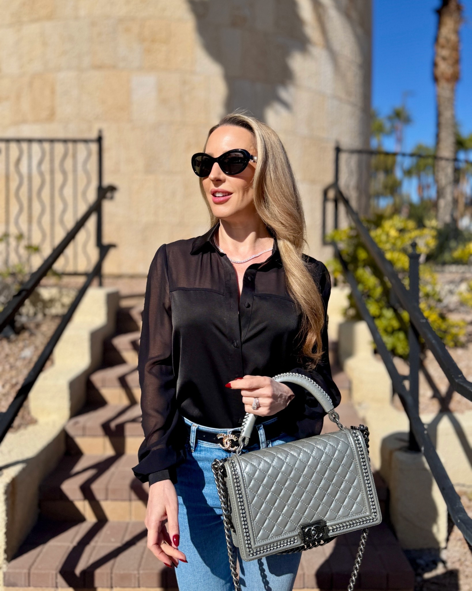 Classic style OOTD: black button down shirt, blue wide leg jeans, tennis necklace and Chanel bag. 

#LTKootd #LTKSeasonal #LTKPetite