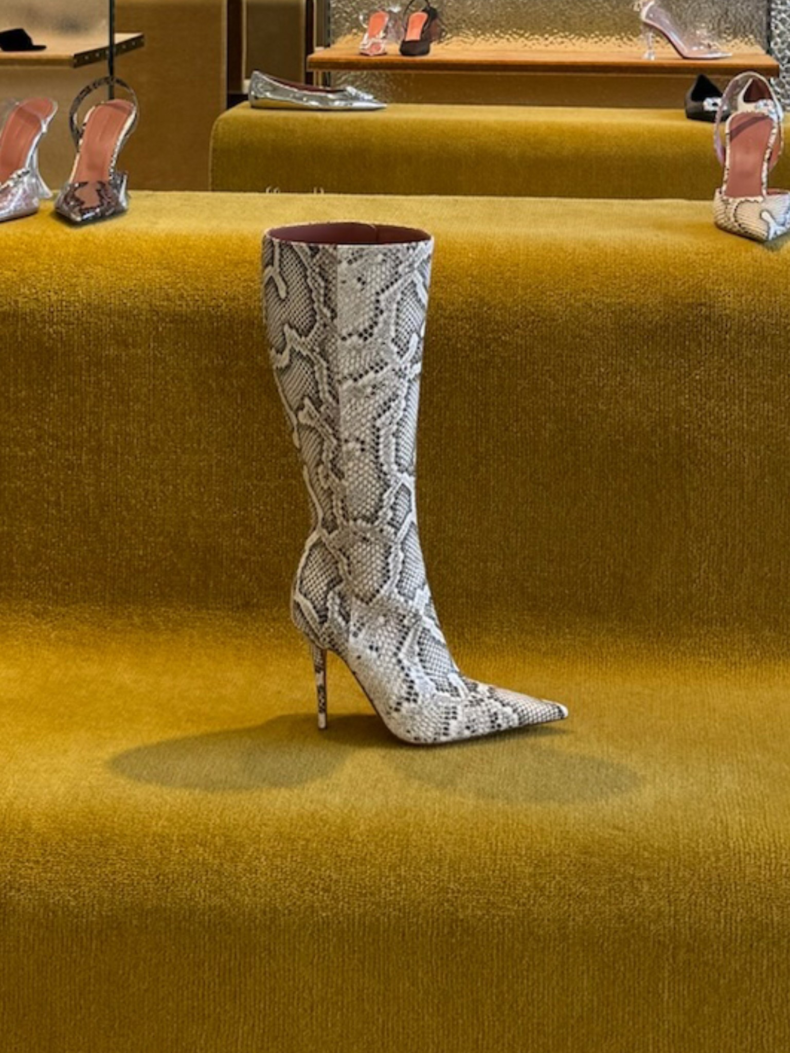 Snakeskin heeled boot find! 

#LTKStyleTip #LTKShoeCrush