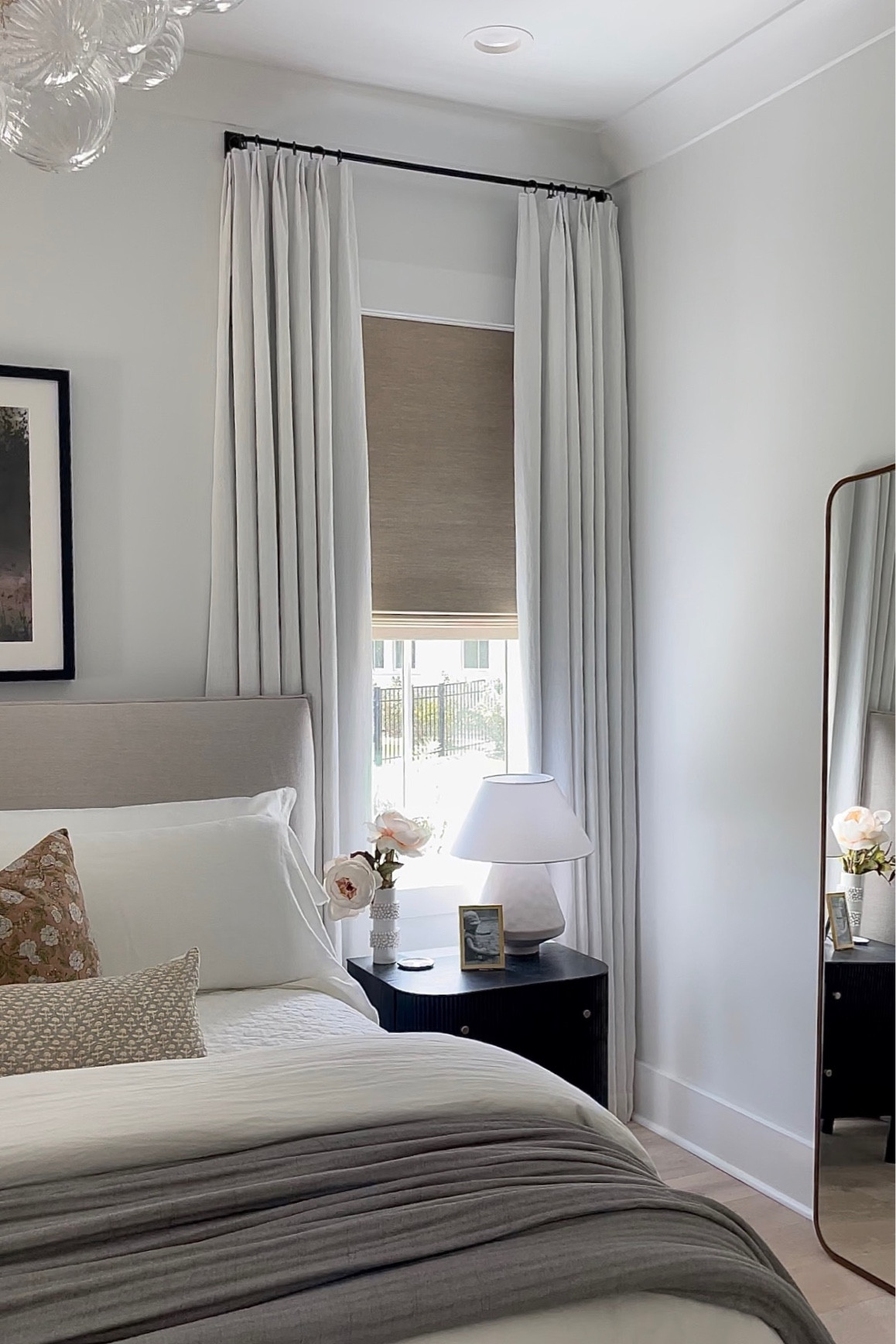 Bedroom. Master bedroom.  White curtains.  Black nightstand. White bedding. Floor mirror.  Gold chandelier 

#LTKFind #LTKSeasonal #LTKhome