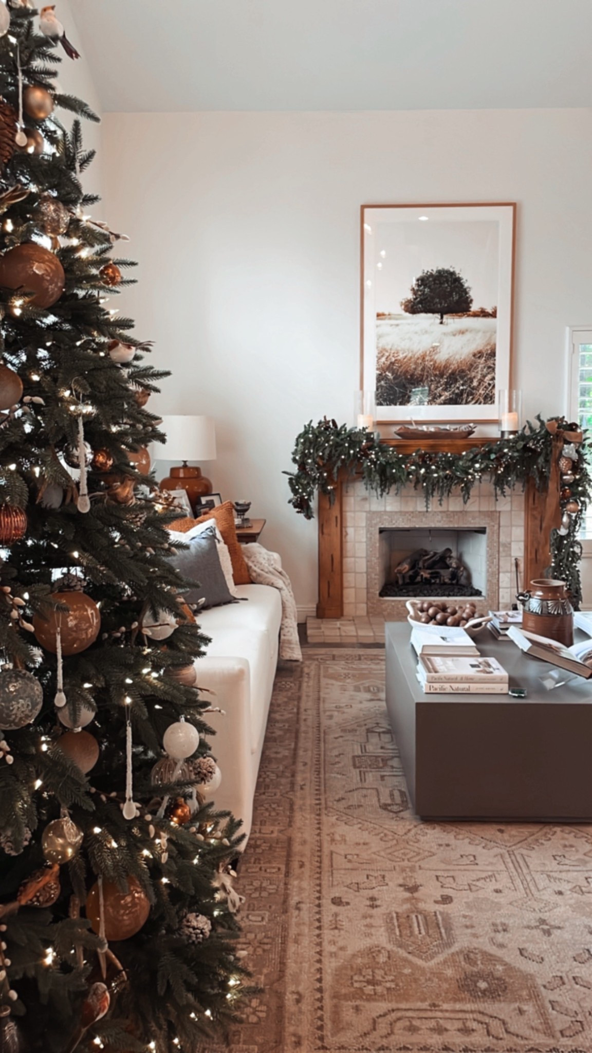 Living room Christmas decor coming along 🙌🏻

#christmastree #christmasdecor #holiday #garland #ornaments #manteldecor 

#LTKCyberWeek #LTKHoliday #LTKHome