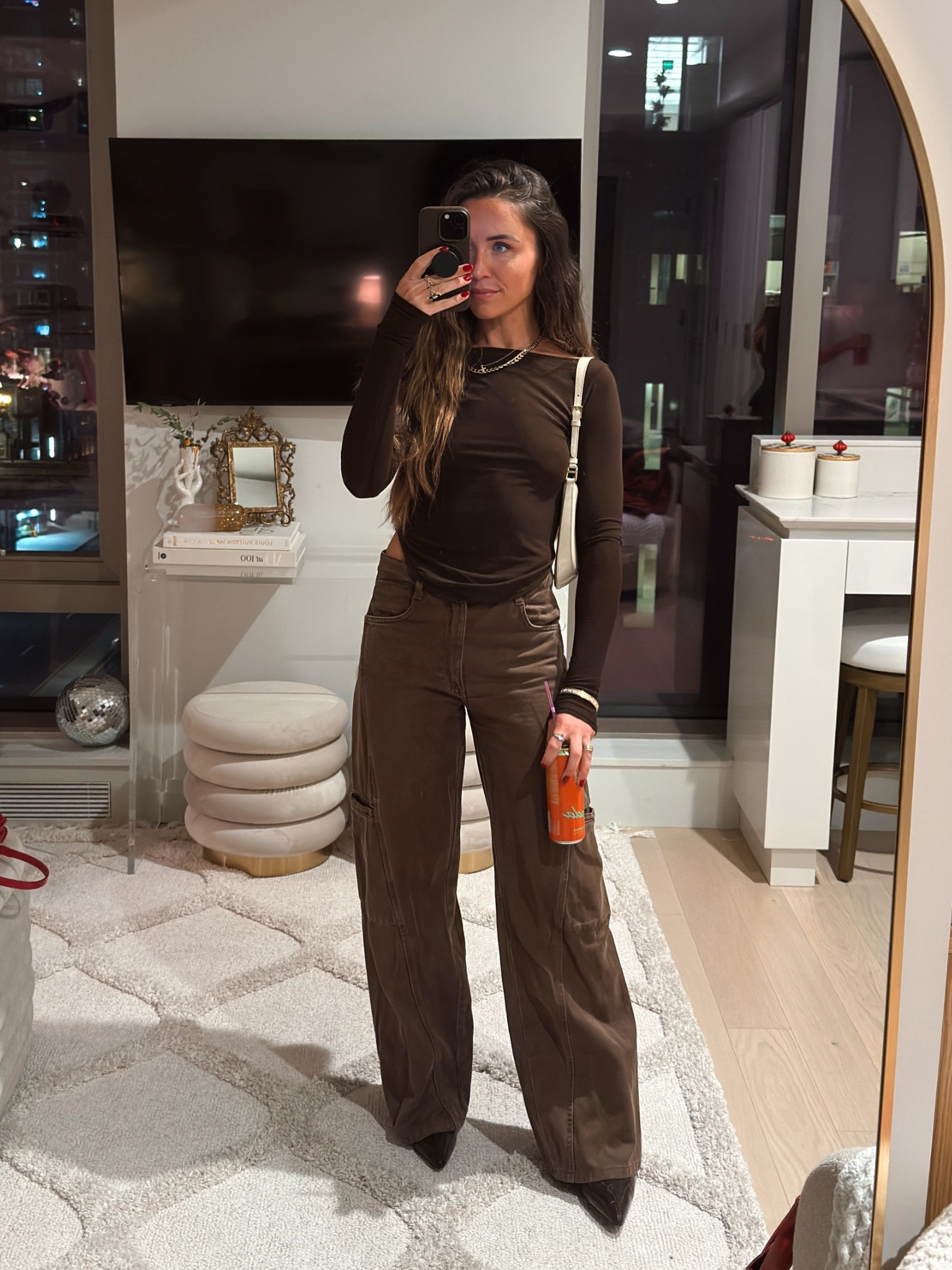 brown fall outfit that I wore to a concert 🐻
Brown mesh long sleeve top (wearing a small)
My brown cargo jeans are from H&M FOREVER ago, but I linked similar ones! Paired it with a brown booties and some gold jewelry! 

Linked the waver I used for my hair 💇🏻‍♀️

Wore it with a cropped black leather jacket that has brown tones in it that I’ll link. I wore a XS. They also have an all brown jacket, but I thought the black with brown tones would be more versatile.