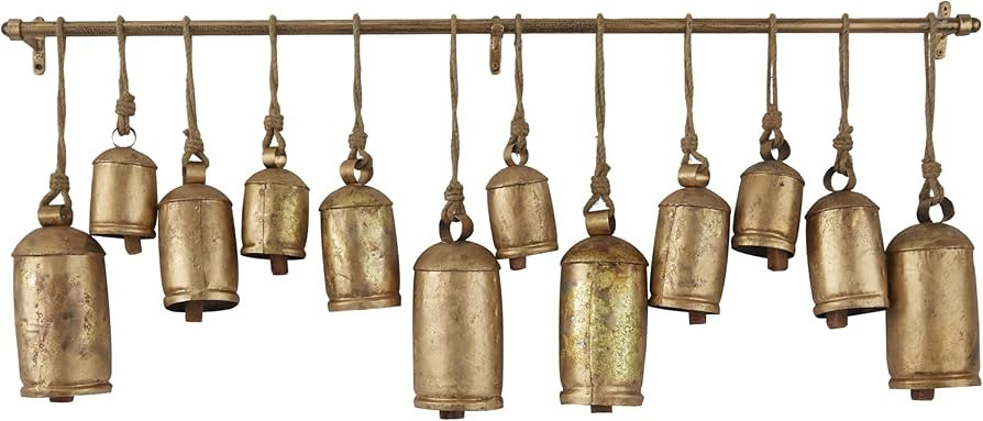 Deco 79 Metal Decorative Cow Tibetan Inspired with 12 Bells on Jute Hanging Ropes and Rod, 48" x ... | Amazon (US)