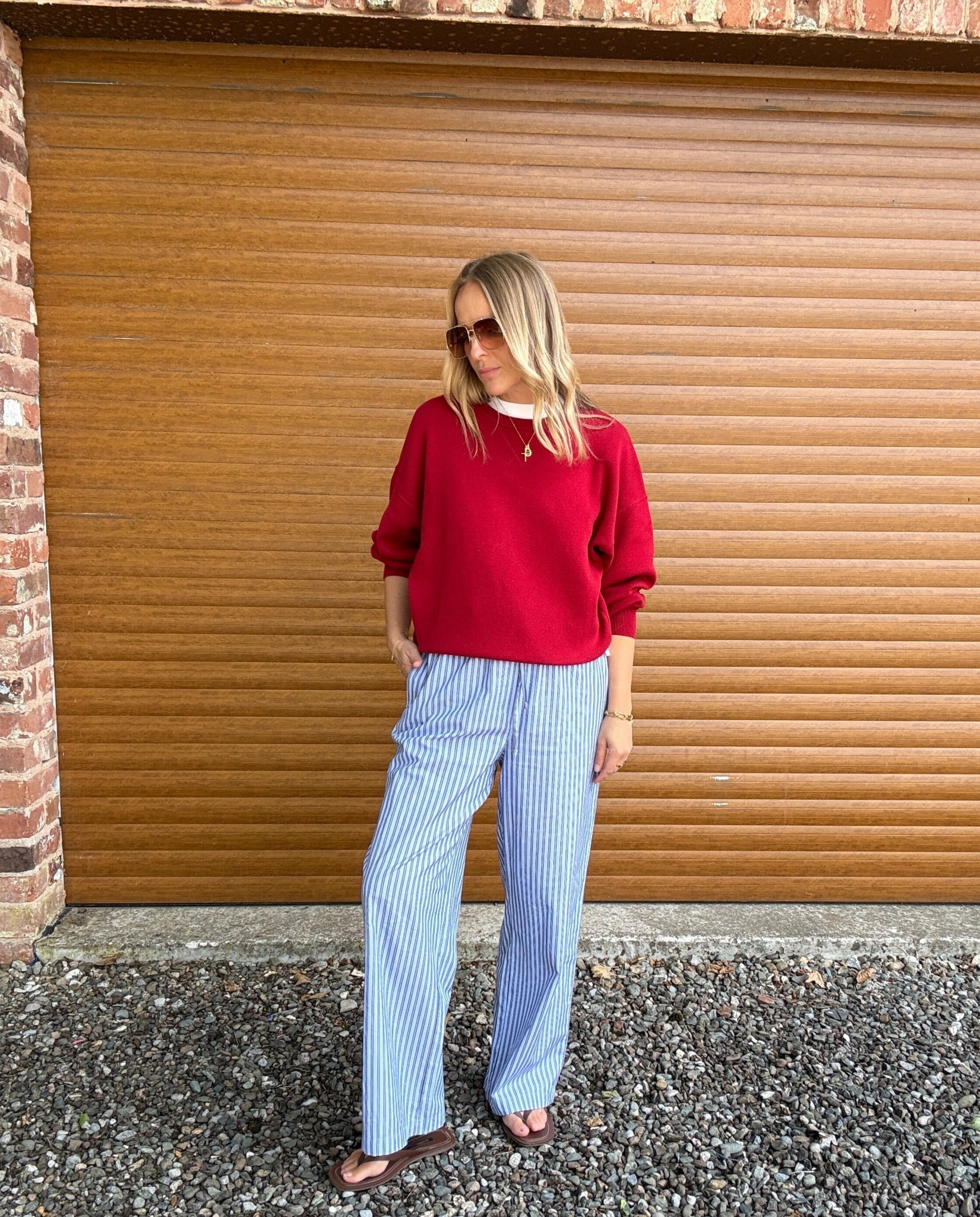 Transitional styling 
Adding that 🍒 red cotton jumper to a lighter pair of cotton trousers … 

Wearing a large in the jumper 
Medium jn the trousers 

#LTKmidsize #LTKtravel #LTKsummer