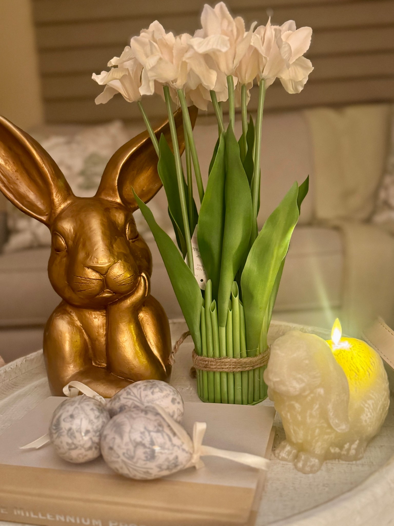 Soft, neutral Easter styling made simple 🤍🐰✨

This cozy little tray moment came together with a few of my favorite pieces—gold bunny decor, faux florals, neutral eggs, and a soft glowing candle for that warm spring feel. It’s an easy way to elevate your Easter table, entryway, or coffee table in minutes!

I linked finds to recreate this look 👇🏻

#ltkhome #ltkseasonal #easterdecor #springdecor #neutralhome #homedecorfinds #easterinspo #cozyhome #decorideas #springstyling