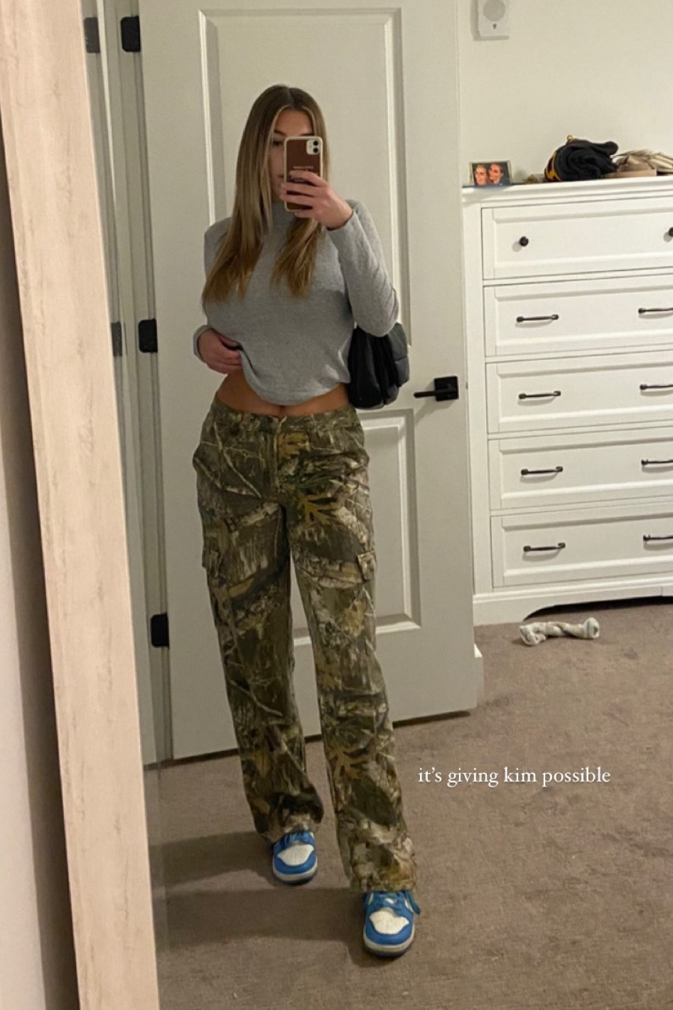 This outfit is under $100! Camo pants paired w a gray turtleneck and sneakers. 

sneakers l camo pants l camo outfit l pants l gray shirt