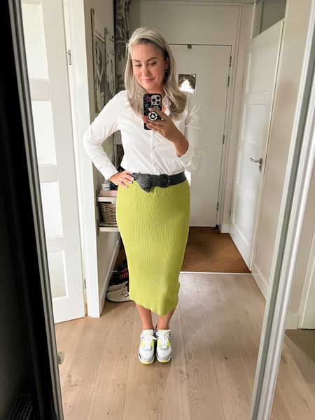 Outfit of the day. A chartreuse rib knit midi skirt that would perfectly transition into fall, paired with a crisp white shirt, a woven belt and Nike air max sneakers. 



#LTKworkwear #LTKeurope #LTKunder50