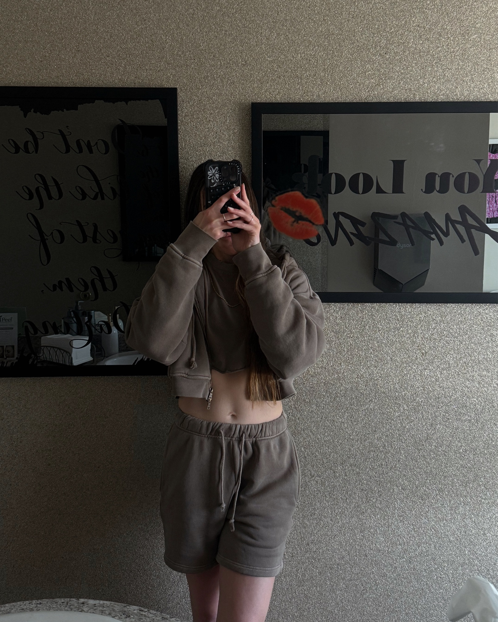 Cute sweatshirt set! Oversized and super comfy! Heavyweight. Also comes in black, gray, white! Wearing a size medium in sweater, small and T-shirt and tank top, and extra small in shorts. I am 5’10” normally size 25. Runs true to size except size up in sweater for a more oversized fit.