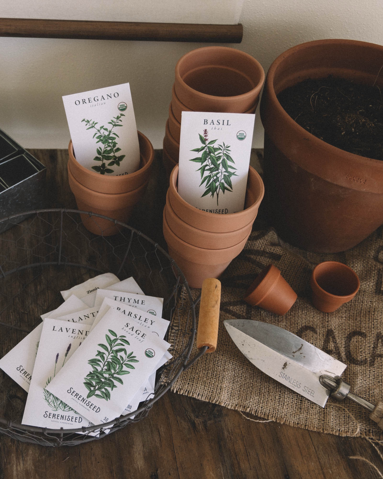 Starting my kitchen herb garden 🌿 Basil, oregano, thyme, parsley, and sage tucked into classic terracotta pots with fresh potting mix and my favorite stainless steel hand trowel.

If you’re planning an indoor herb garden, organic seeds + clay pots with drainage are the easiest place to start. 

#herbgarden #indoorgarden #seedstarting #kitchenherbs #terracottapots #gardentools #organicgardening

#LTKHome #LTKSeasonal #LTKvlog