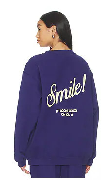 The Mayfair Group Smile Oversized Crewneck Sweatshirt in Navy Blue from Revolve.com | Revolve Clothing (Global)