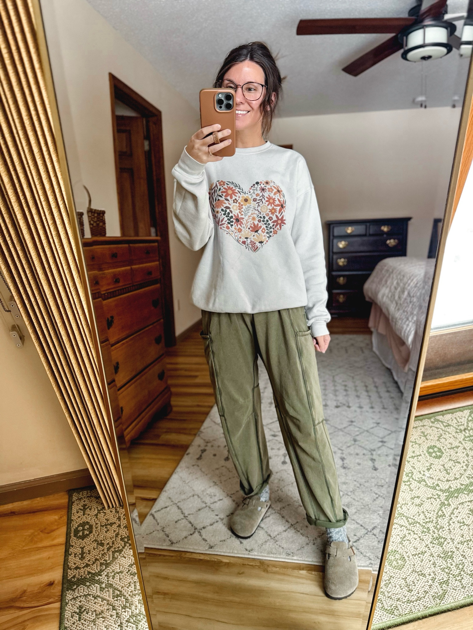 Wearing size small in this crewneck sweatshirt (use MARISSA20 for $$ off) and size xs in the pants! Great for petites (I also linked them in the other color I have them in). I am going to put a stitch in them to keep them rolled/cuffed like this. My clogs fit best a 1/2 size down.


#LTKFindsUnder50 #LTKShoeCrush #LTKStyleTip