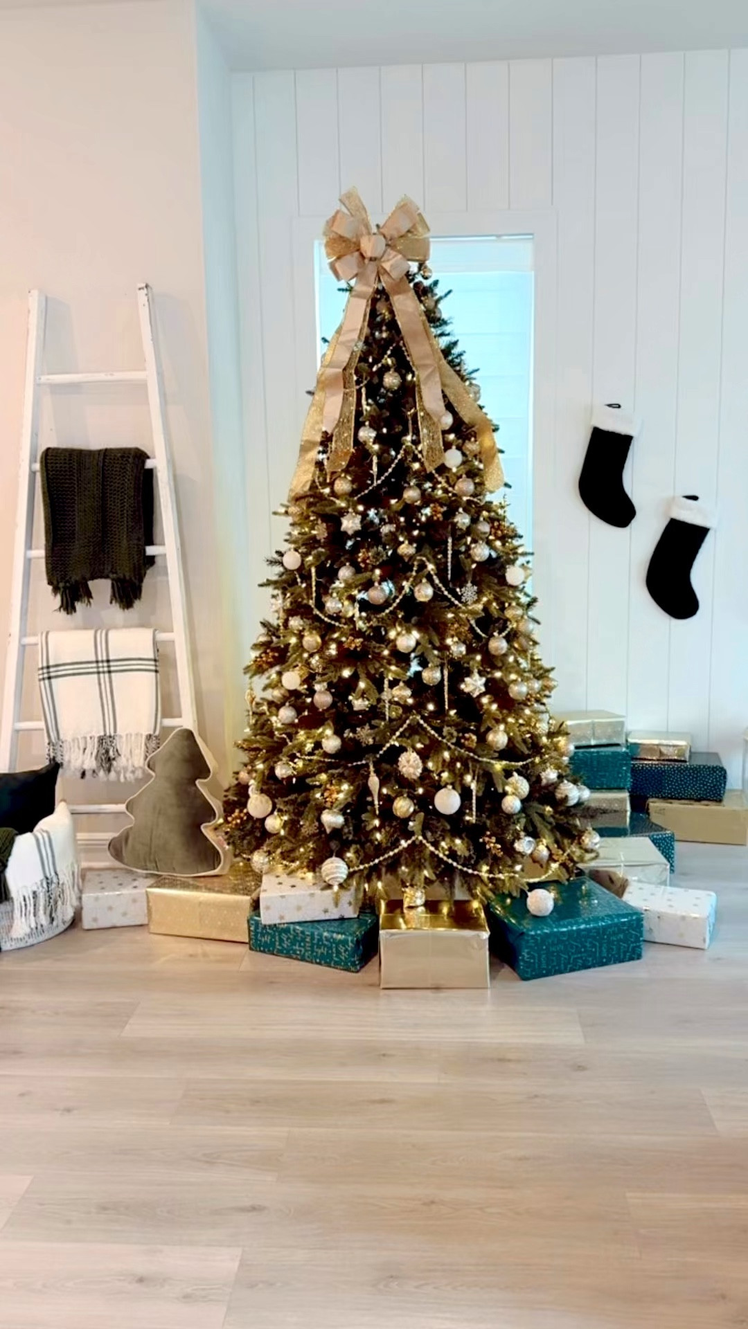 Christmas Tree + Holiday Decor 🎄✨

I linked everything we used to decorate our Christmas tree and living room for the holidays. This year, we used a variety of white and gold ornaments. This made for an elegant + traditional Christmas tree aesthetic. I matched the colors of the Christmas tree with green, gold, and white wrapping paper. We also strung a gold and white beaded garland on the tree and topped it with an oversized gold bow. This ribbon bow tree topper came pre-made which was very convenient. To add pops of glitz and glamour to the tree, I added gold Christmas stems. To add some texture, I used a knitted white tree skirt that has lasted me years. In our blanket basket and blanket ladder, I added green and plaid blankets to match and cozy up the space. I joined this year’s trend with tree shaped pillows to  Don’t forget to hang the green stockings! 

#LTKHome #LTKSeasonal #LTKHoliday