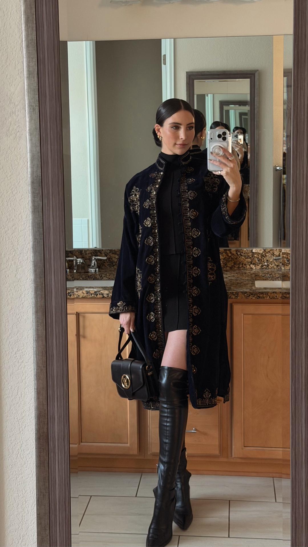 OOTN: outfit of the night as someone who is chronically overdressed in Denver. 🖤✨

Dinner at Palace Arms calls for drama, beaded embroidery, and a knee-high boot moment, ➡️ then walked across the street to the Paramount Theater for a night of laughs with Hannah Berner.

Shop this look on LTK.

#ootn #denver #denverstyle #whattowear 
