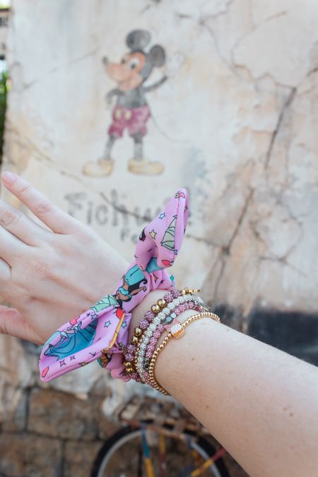 •Disney bracelet stack: @stoneyclover scrunchie, @baublebar Disney bracelets, @rusticcuff bracelets 💕 I love a good bracelet stack! My go to bracelets have been Rustic Cuff and my Disney Baublebar bracelets for Disney days. The perfect mix of sparkle and Disney ✨

My Baublebar bracelets are currently $10 + their other bracelets are 20% off!• 

#LTKunder100 #LTKunder50