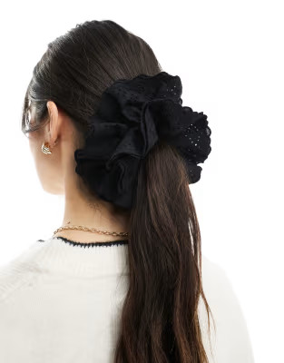 ASOS DESIGN eyelet scrunchie in black | ASOS | ASOS (Global)