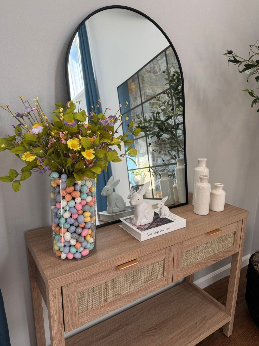Easter decor. Home decor. Spring decor. Home accents. Vase fillers. Easter foam eggs. Artificial easter eggs. Basket fillers. Pastel easter eggs. Artificial flowers. Daisy flowers. Fake spring branches. Fake flowers. Faux flowers. Wooden bunny decor. Bunny figurines. Easter bunny. Glass vase. Cylinder vase. Arched mirror. Wall-mounted mirror. Wall mirror. Console table. Entryway table. Ceramic vase. Decorative vase. Table decor.

#LTKHome #LTKStyleTip