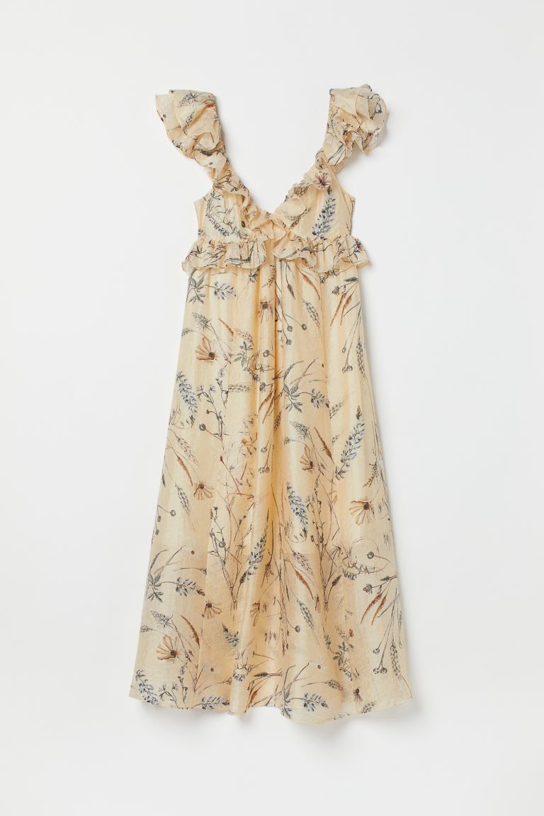 Patterned, calf-length dress in a woven lyocell blend. Low-cut V-neck at front with ruffle trim e... | H&M (US + CA)