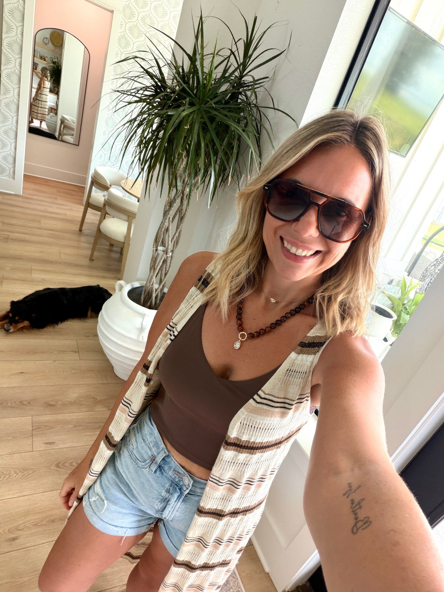 Wearing a Small in the duster vest, sized up to medium in the sports bra for length, and denim shorts are roomy but TTS. #aerie #ae @Aerie @ae

#LTKootd #LTKmomlife