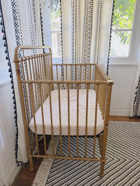 The perfect little gold mini crib 

#LTKfamily #LTKkids #LTKbaby
