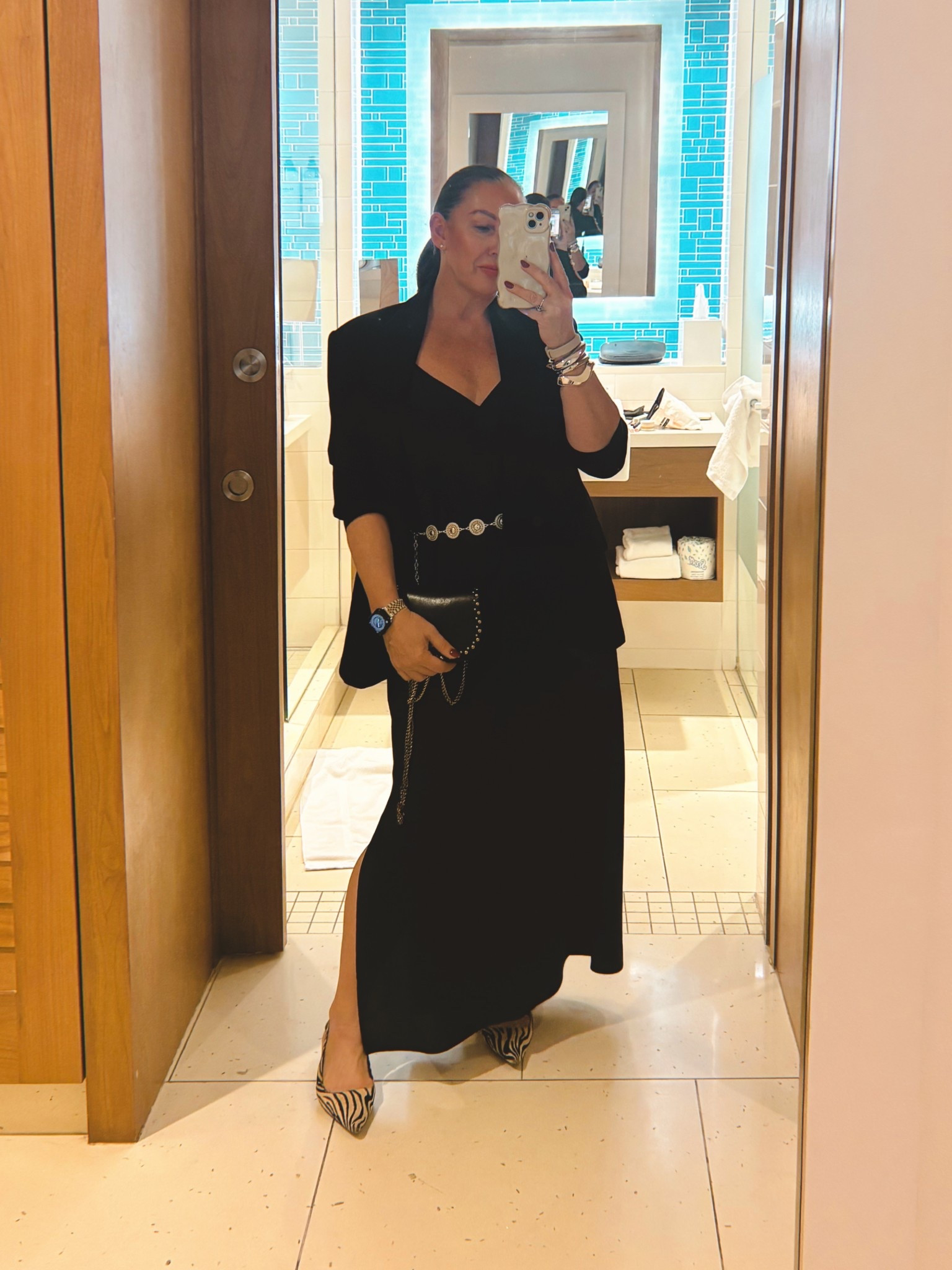 Friday night, date night outfit. Long maxi slip dress. Black blazer. Silver chain belt. Kitten heels. 


#LTKStyleTip #LTKOver40 #LTKMidsize