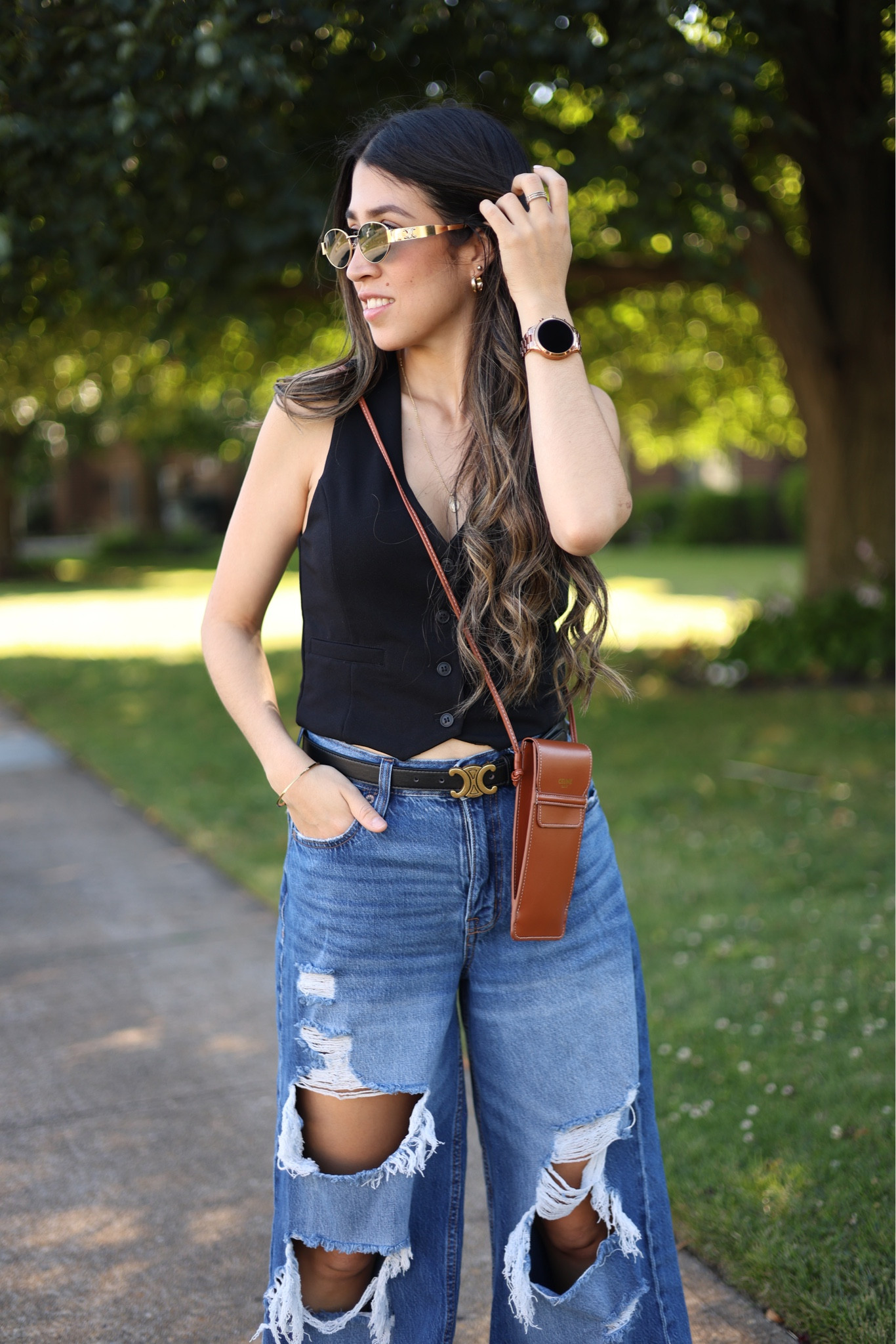  Today I'm rocking a comfy summer vibe with my fave ripped jeans, a black vest, and comfy sandals. Adding a touch of chic with my Celine belt and sunglasses. Perfect outfit for a casual summer day out! OOTD

#LTKSummerSales #LTKStyleTip #LTKxNSale