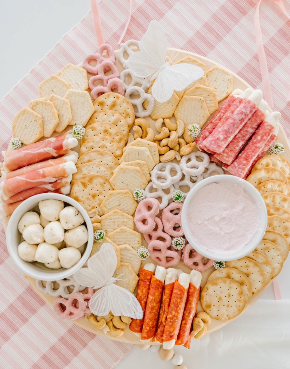 Aesthetic food board pastel colors / 🌸 Pink Charcuterie Board 🌸 💕 Obsessed with the new eating pink things these days and with Valentine’s approaching, here are my top tips to create pink charcuterie magic: 🍓 Pink Fruits: Include a variety of fresh and dried pink fruits like strawberries, raspberries, watermelon, and dragon fruit. 🧀 Cheeses: Opt for pink or blush-hued cheeses like cranberry cheddar, goat cheese with cranberries, or a creamy raspberry-infused cheese. 🌟 Cured Meats: Select light-colored cured meats that complement the pink theme, such as prosciutto, turkey, or even rosemary-infused ham. 🌷 Spreads and Dips: Introduce pink-themed spreads like beetroot hummus, raspberry compote, or strawberry jam to add flavor and color. 🌺 Extras: Add whimsical elements such as pink macarons, edible flowers, or even pink chocolate for a touch of sweetness. 👋🏼 Would you try this pink charcuterie for your party? 🌸

#LTKparties #LTKhome #LTKSeasonal