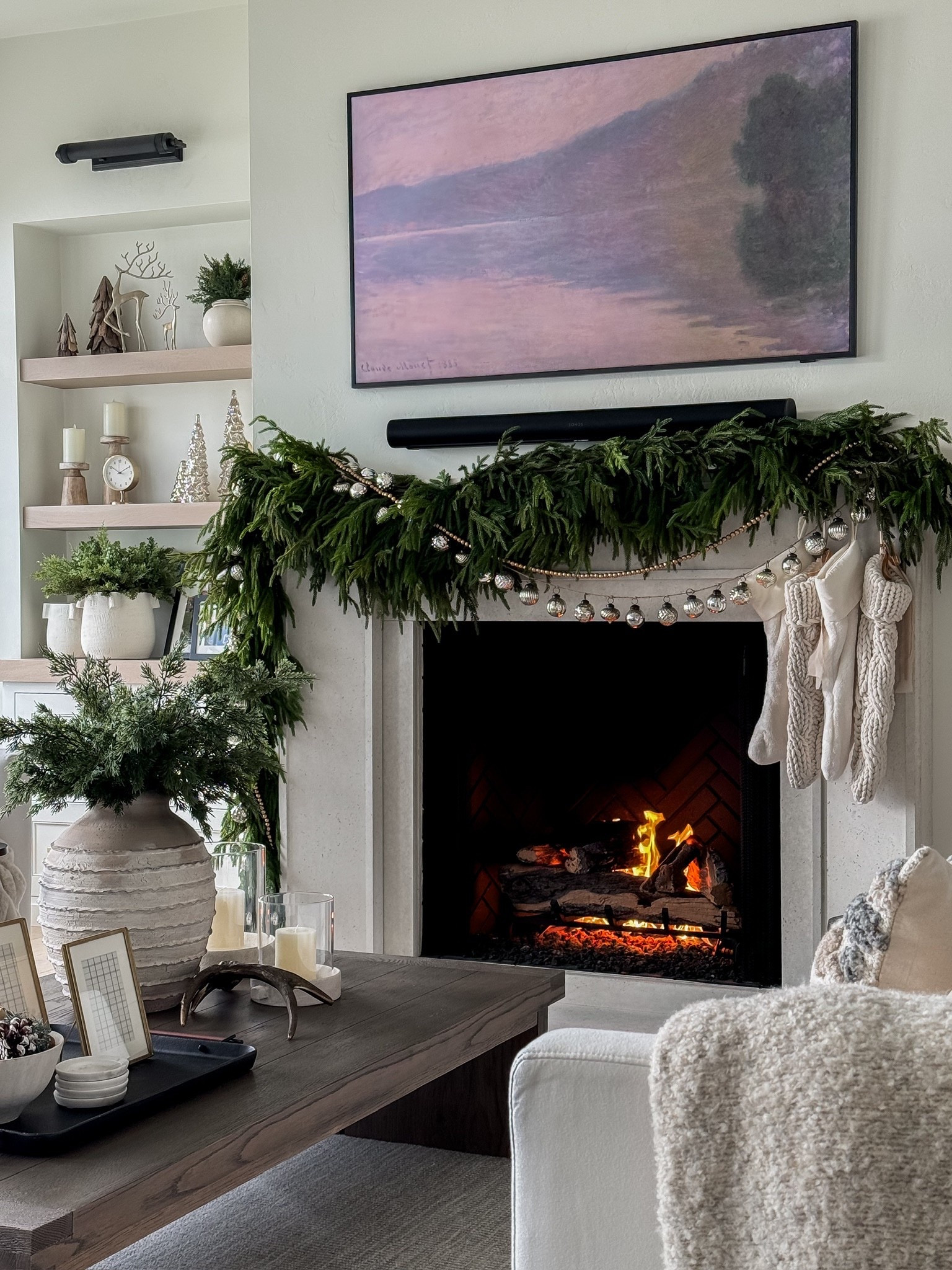 Fireplace season feels even cozier with a little greenery, soft textures, and all the warm glow ✨🔥 #holidaydecor #homedecor 

#LTKSeasonal #LTKHoliday #LTKHome