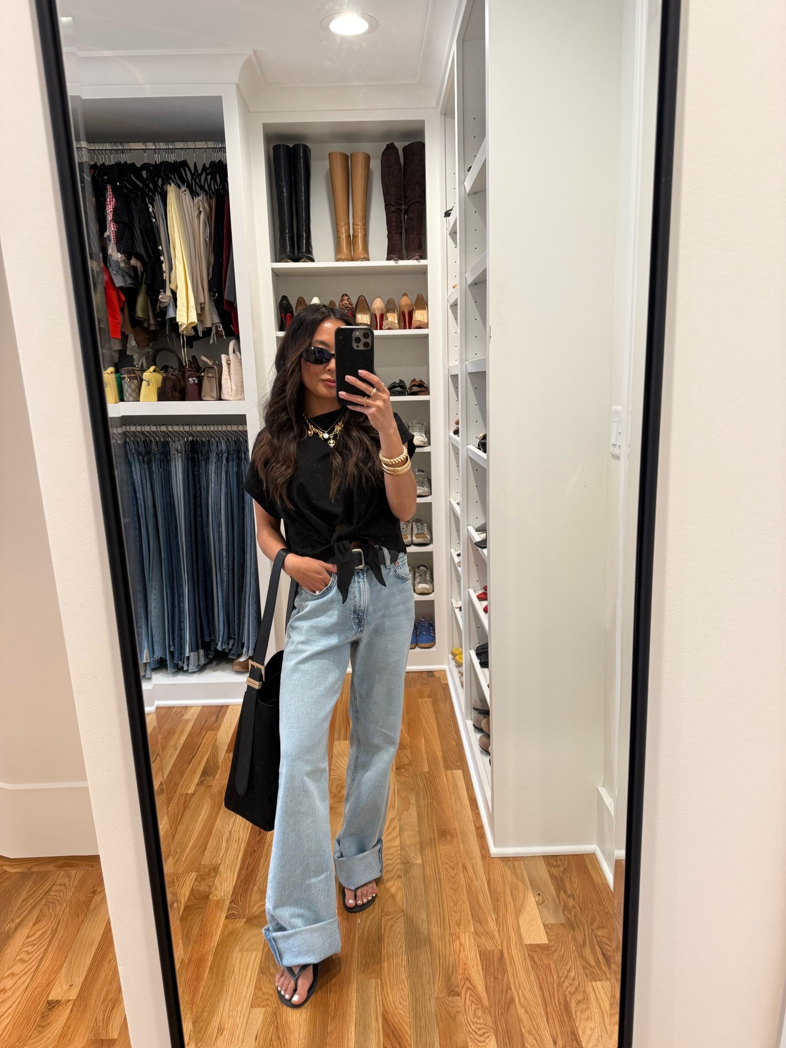 Ended up loving these jeans and almost sent back! They’re actually too big except I rolled the bottoms for a bigger cuff and now I’m loving how loose vintage feel they are!! Soo good! 
Jeans are 24
Top is S
Belt is from OldStud 
Flip flops are 5/6