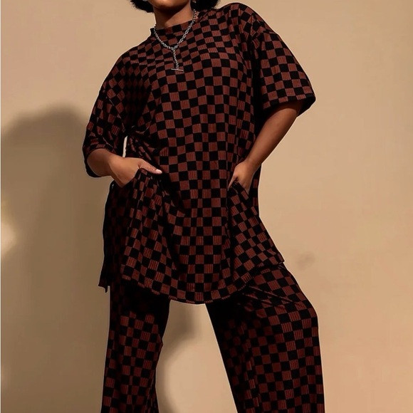 Dressed in LALA Leveled Up Ribbed Playsuit in Black + Mocha Checkerboard | Poshmark