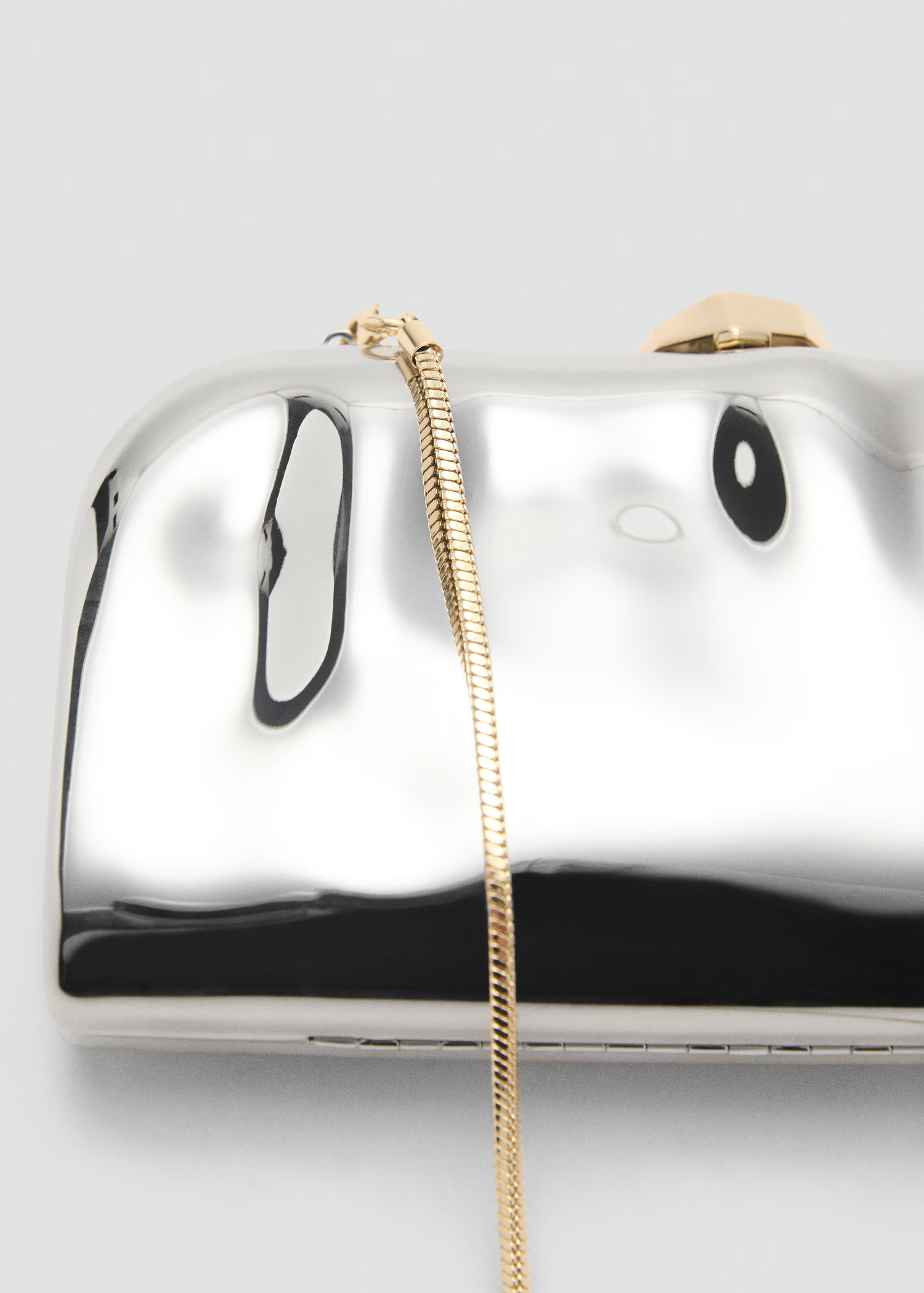 Chain clutch bag - Women | MANGO United Kingdom | MANGO (UK)