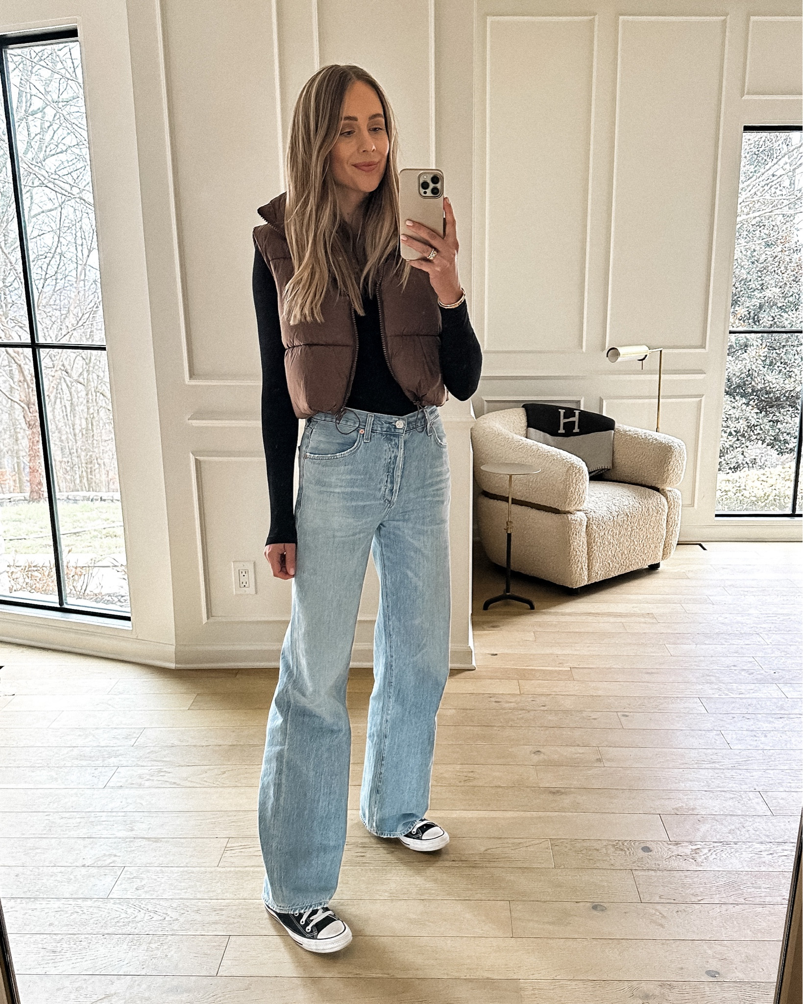 Fashion Jackson wearing Amazon fashion puffer vest, wide leg jeans, converse sneakers, #fashionjackson #amazonfinds  

#LTKstyletip #LTKshoecrush #LTKunder100