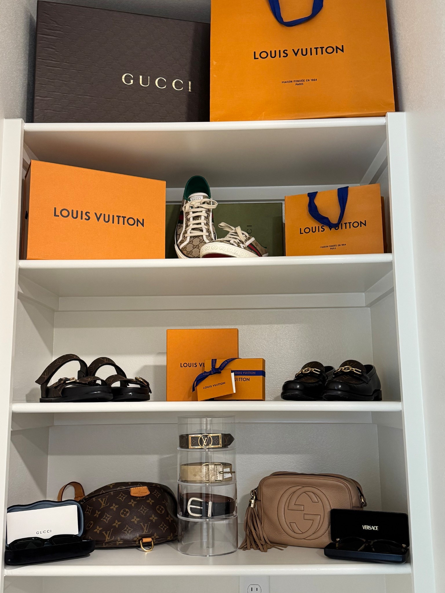 luxury closet organization | Gucci sneakers | Gucci purse | Louis Vuitton 

#LTKShoeCrush #LTKHome