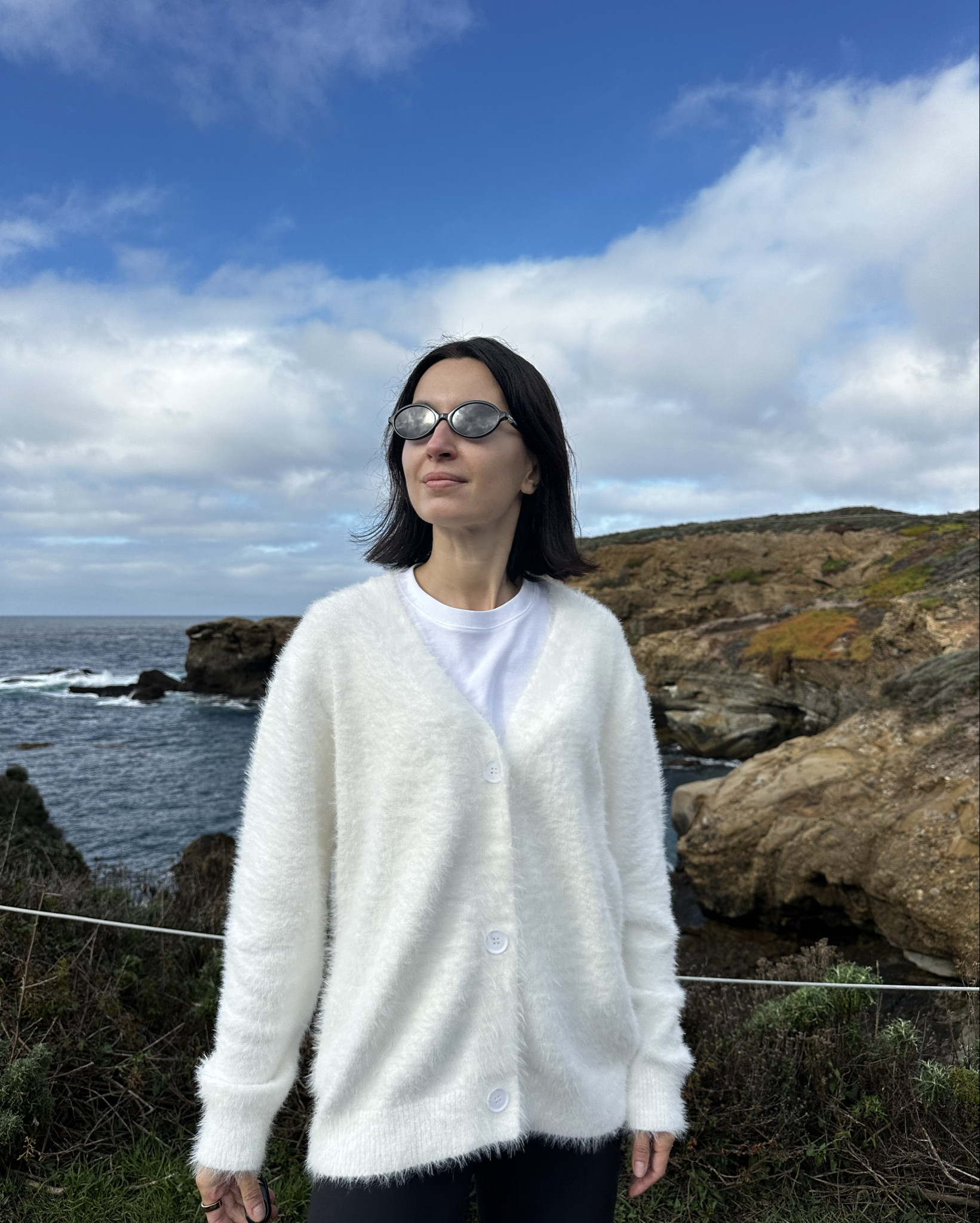 White fluffy cardigan 

#LTKU #LTKTall