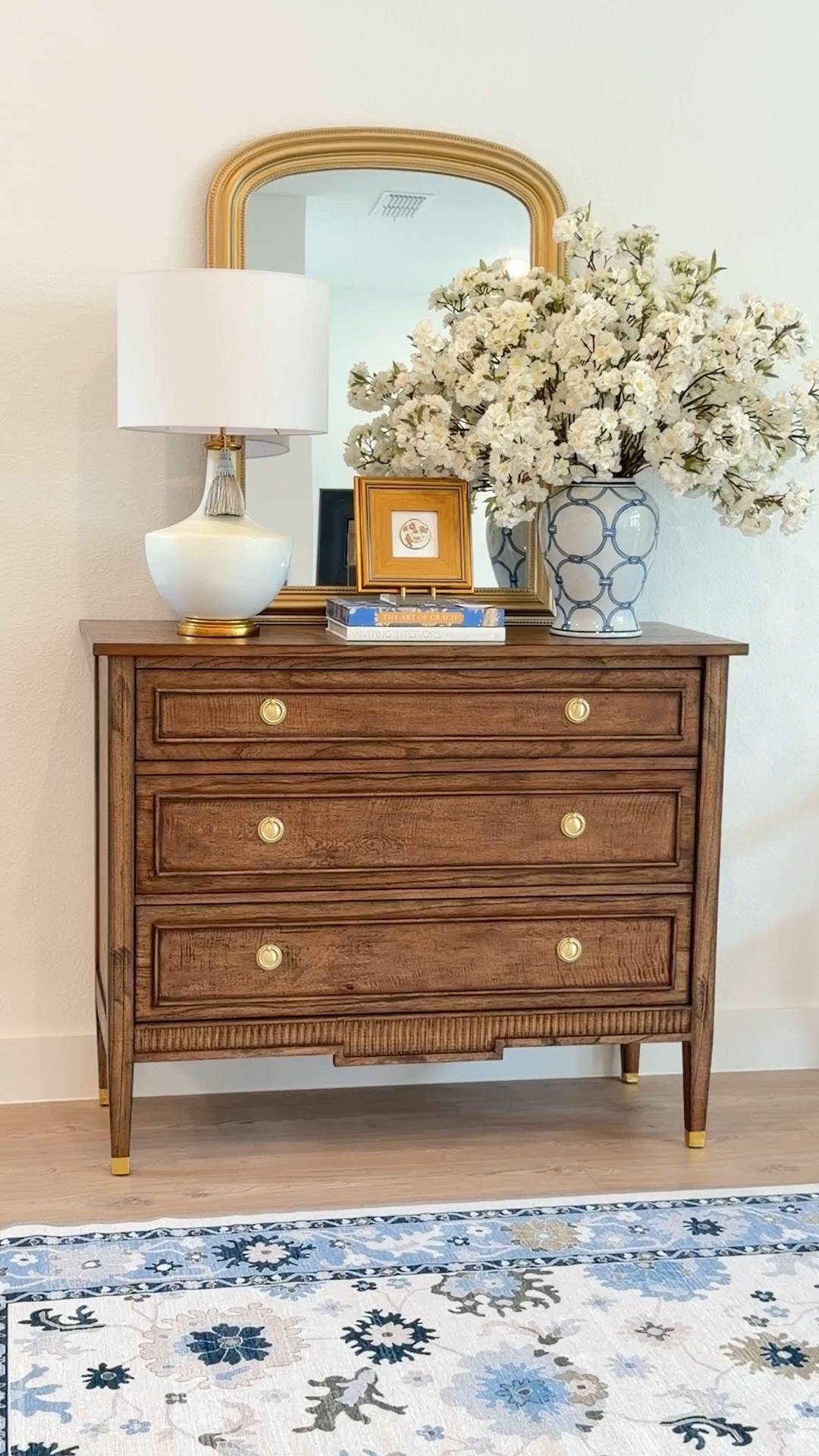 Spring decor white cherry blossoms French chest of drawers white avd gold lamp blue and white ginger jar #wayfair

#LTKSeasonal #LTKHome #LTKSaleAlert