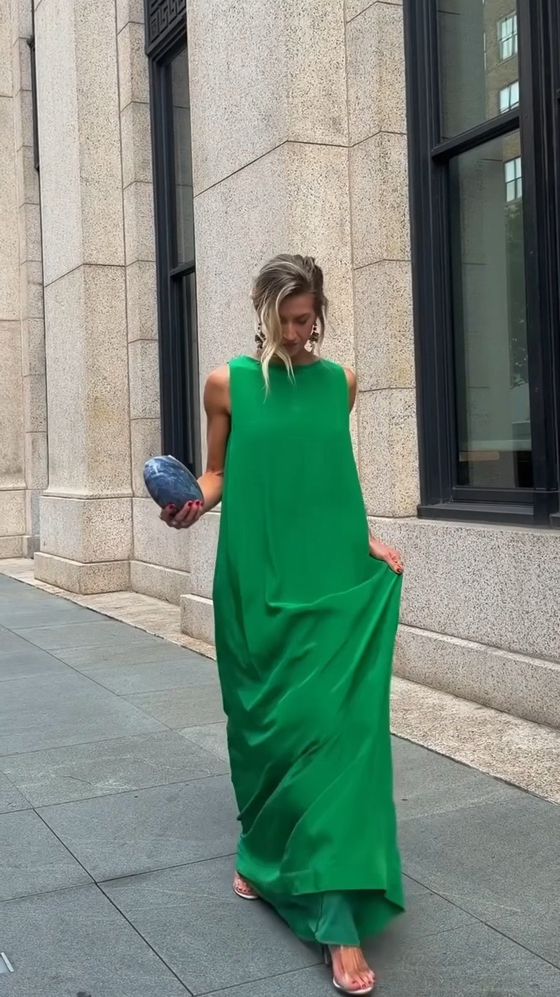 Emerald green silk gown for the LTK NYFW party - fits and drapes like a dream! Runs TTS, wearing XS

Clear nude sandals: SO comfortable, run TTS, go with everything. 

Blue marbled clutch, gold floral drop earrings

#LTKgrwm #LTKNYFW #LTKWedding