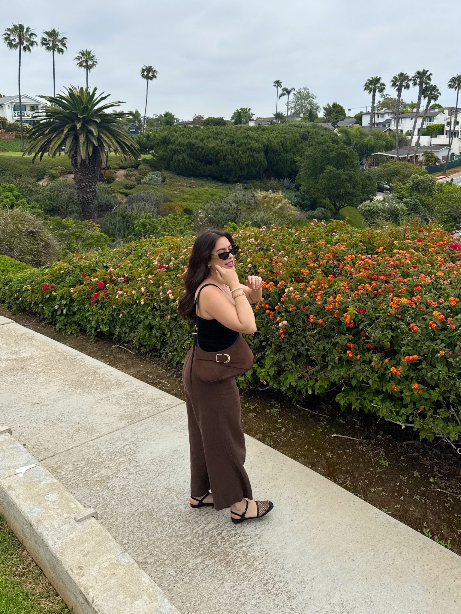 Black rubber tank w/ built in bra! Paired with brown linen pants and a fun slip on shoe 

#LTKMidsize #LTKStyleTip #LTKSeasonal