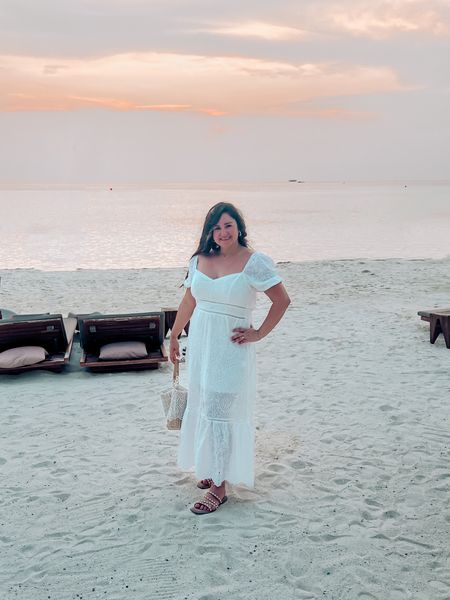 Wore this beautiful white dress for my 5 year wedding anniversary 🥰
Paired with pearl studded sandals and a rattan purse!

Wearing a 12 in the dress

Amazon dress, white dress, beach dress, 

#LTKFind #LTKtravel #LTKcurves
