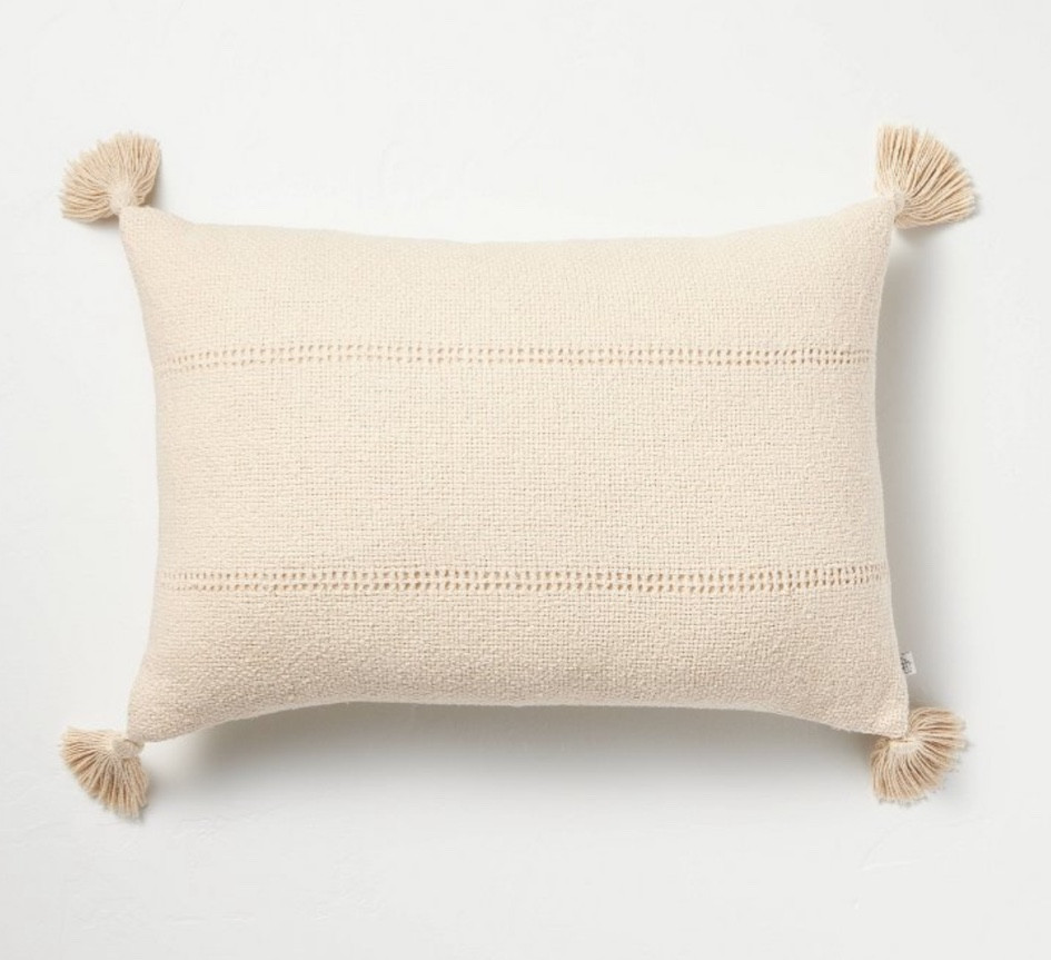 Tan stitch strip lumbar throw pillow with tassels. 

#LTKHome #LTKFindsUnder50