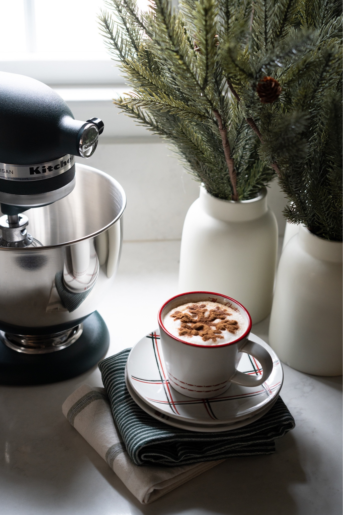 The Baking Station is back just in time for the festive season and @target is stocking us up on the best supplies! 

#TargetPartner I love creating a Baking Station for the festive season so it’s super easy and cozy to spend time whipping up all of our holiday faves!  

Hanging a wreath over the window & potted trees to the counter really gets the mood started!  No Baking Station is complete without a Kitchenaid.  And this one in green is just DELICIOUS!  @target has some of the CUTEST holiday supplies, starting with sets of kitchen towels, snowflake embossed measuring cups, and plaid plates!  The snowflake stencil that comes with the red stitched mug might just be my favorite! 

#houseofvalentina #holidaystyle #bakingseason #holidaydecor #holidaybaking #liketkit @Shop.LTK 

#LTKHoliday #LTKhome #LTKSeasonal