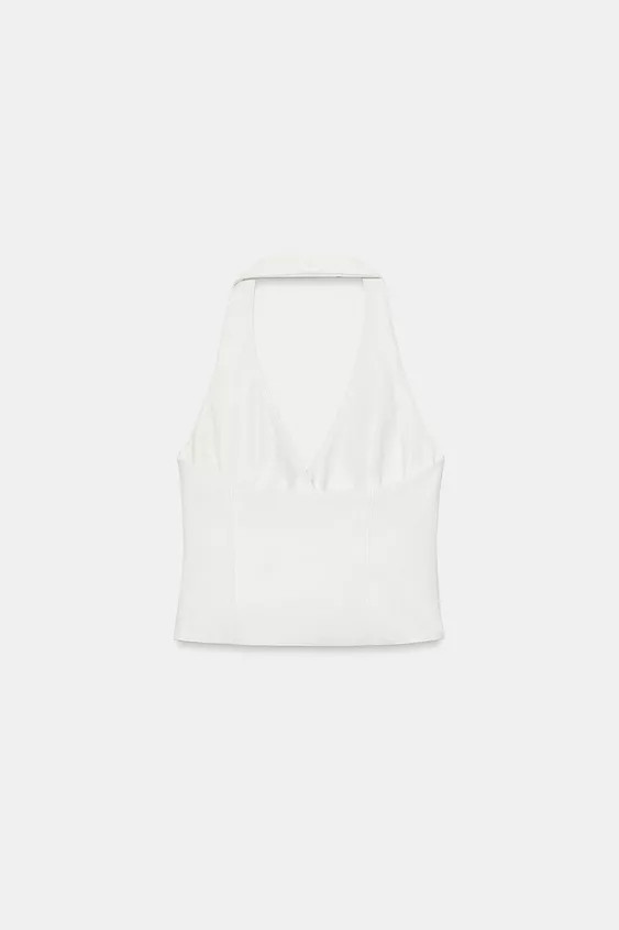 Gr\u00f6\u00dfe des Models: 181 cmKurzes Neckholder-Top mit V-Ausschnitt und R\u00fcckenausschnit... | Zara DE