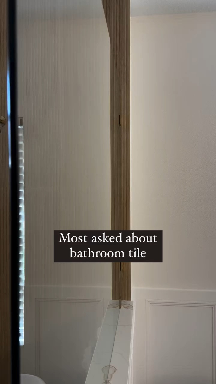 Here she is! 👏🤩

One thing we wanted for our primary bathroom was a spa-like look and feel and this tile was just the ticket. IMO it’s lighter in person than it appears in videos and perfectly coordinates with the white oak vanity we had installed. It gives the space the natural warmth we were hoping for. 

It’s a very large tile which is nice because it means less grout lines and easy to clean. 🧼 Each piece is 16x48.

The exact tile we purchased was the dimensions brand Ribbon Oak Ceramic Tile from Floor & Decor.

Here I’ve included links to very similar products from other retailers such as @homedepot and @loweshomeimprovement as well. 

#bathroomremodel #bathroomremodeling #bathroominspo #primarybathroom #bathroomdesign #homeremodeling #tileideas #showerinspiration #showerinspo

#LTKFamily #LTKHome