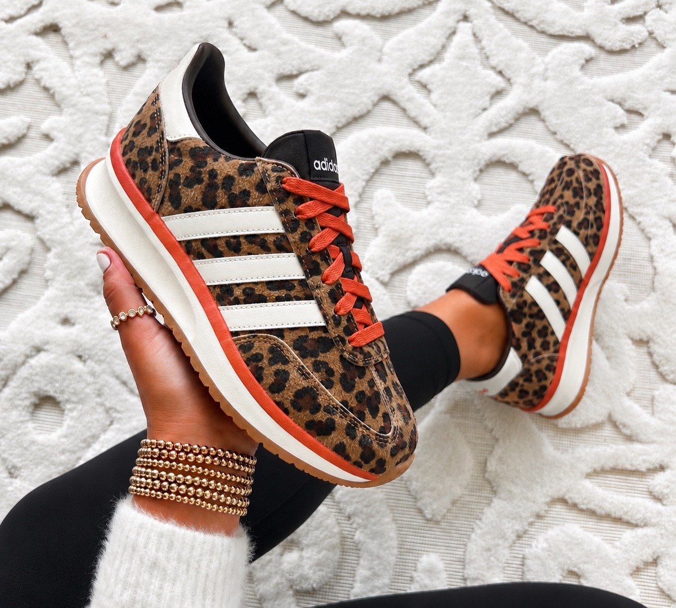 adidas run 70s 2.0 sneakers 🐆🤎

The cutest statement sneaker for fall! The leopard print paired with the pop of coral laces makes these so fun while still being easy to style with jeans, leggings, or a cozy matching set.

sizing: ✨ Runs true to size. If you’re between sizes or like a little extra room with thicker socks, I’d recommend sizing up a half size. They’re lightweight and comfy for all day wear.