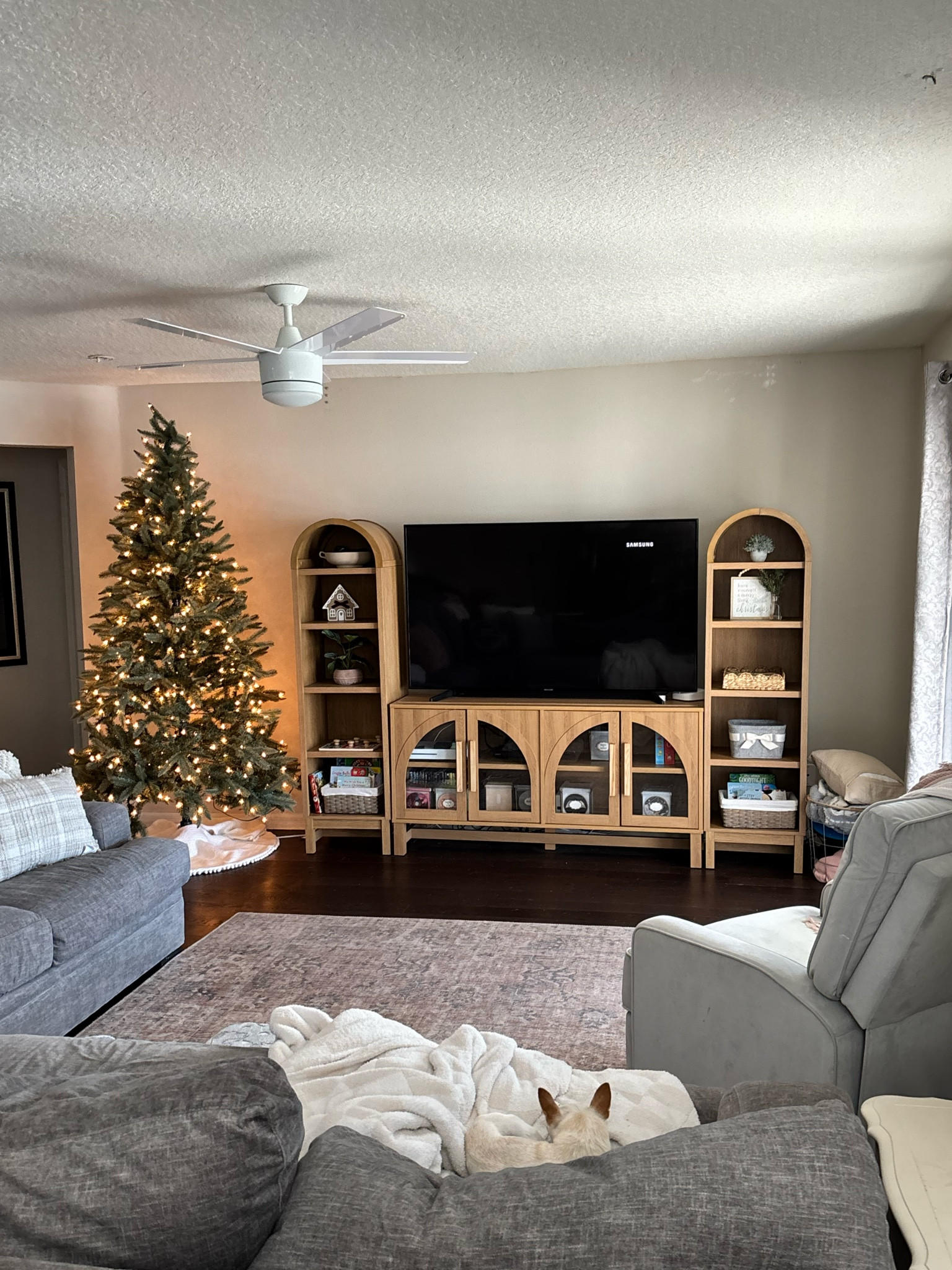 Our tv stand set up
We have a 65 inch tv. 
tv stand & arched bookshelves on each side all from walmart!! 

Bhg arched bookshelf. Bhg home
 #walmarthome @walmart

#LTKHome