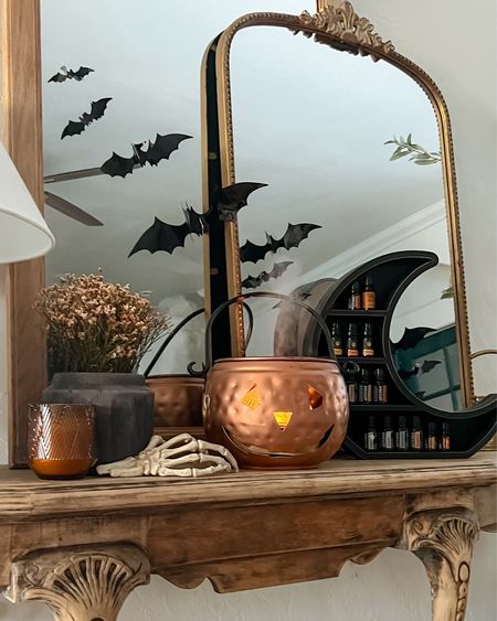 Plop a diffuser into a Jack-o-lantern for a spooky effect all season long and pair with this wooden moon shaped tabletop shelf to store oils. Such a fun combo, bring on all the yummy Halloween essential oil blends! Yes we have a candy corn scent, mmm!🌙🎃

#LTKSeasonal #LTKHoliday #LTKHalloween