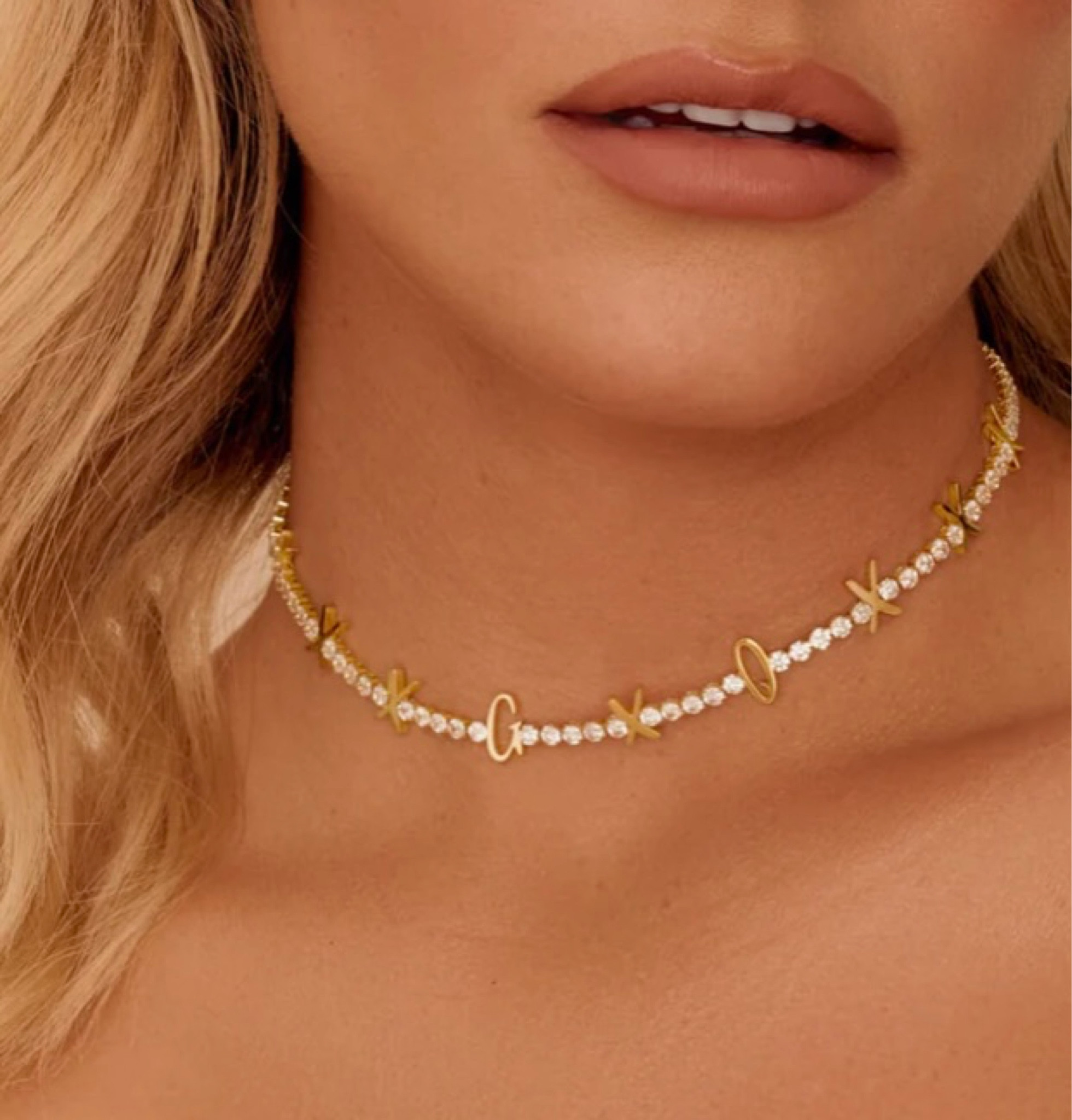 Indulge in the epitome of elegance and extravagance with Abbott Lyon's exquisite personalized gold necklace. Adorn yourself with this lustrous piece of jewelry that exudes a sense of sophistication and style. Crafted with utmost care and attention to detail, this luxurious necklace features a radiant gold finish that adds a touch of opulence to any outfit. The personalized pendant is uniquely designed to showcase your individuality and make a statement that's all your own. Elevate your jewelry collection with this stunning Abbott Lyon creation and make heads turn wherever you go!