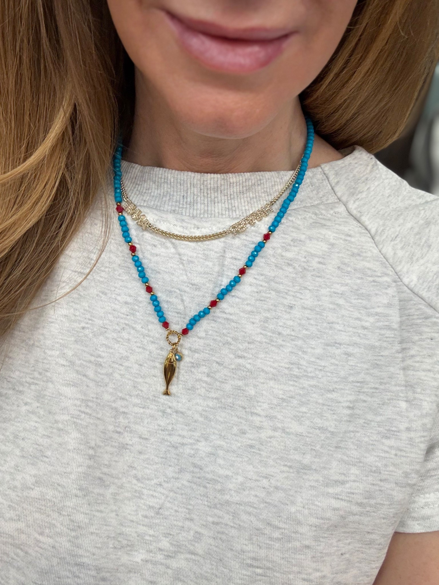How darling is this little beaded fish necklace?! I love the added evil eye charm too! So perfect for vacation and summer. 

#LTKTravel #LTKSeasonal #LTKootd