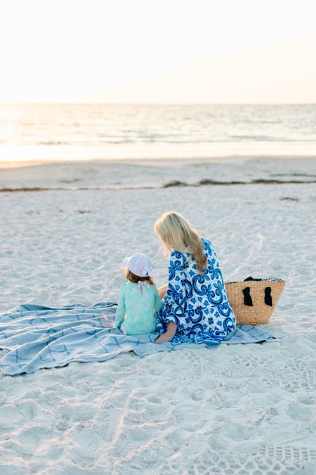 Beach day with my bestie girl #beachessentials Beach day. Beach bag. Beach blanket. Beach coverup up. Tuckernucking. Tbbc. 

#LTKSeasonal #LTKtravel #LTKfamily