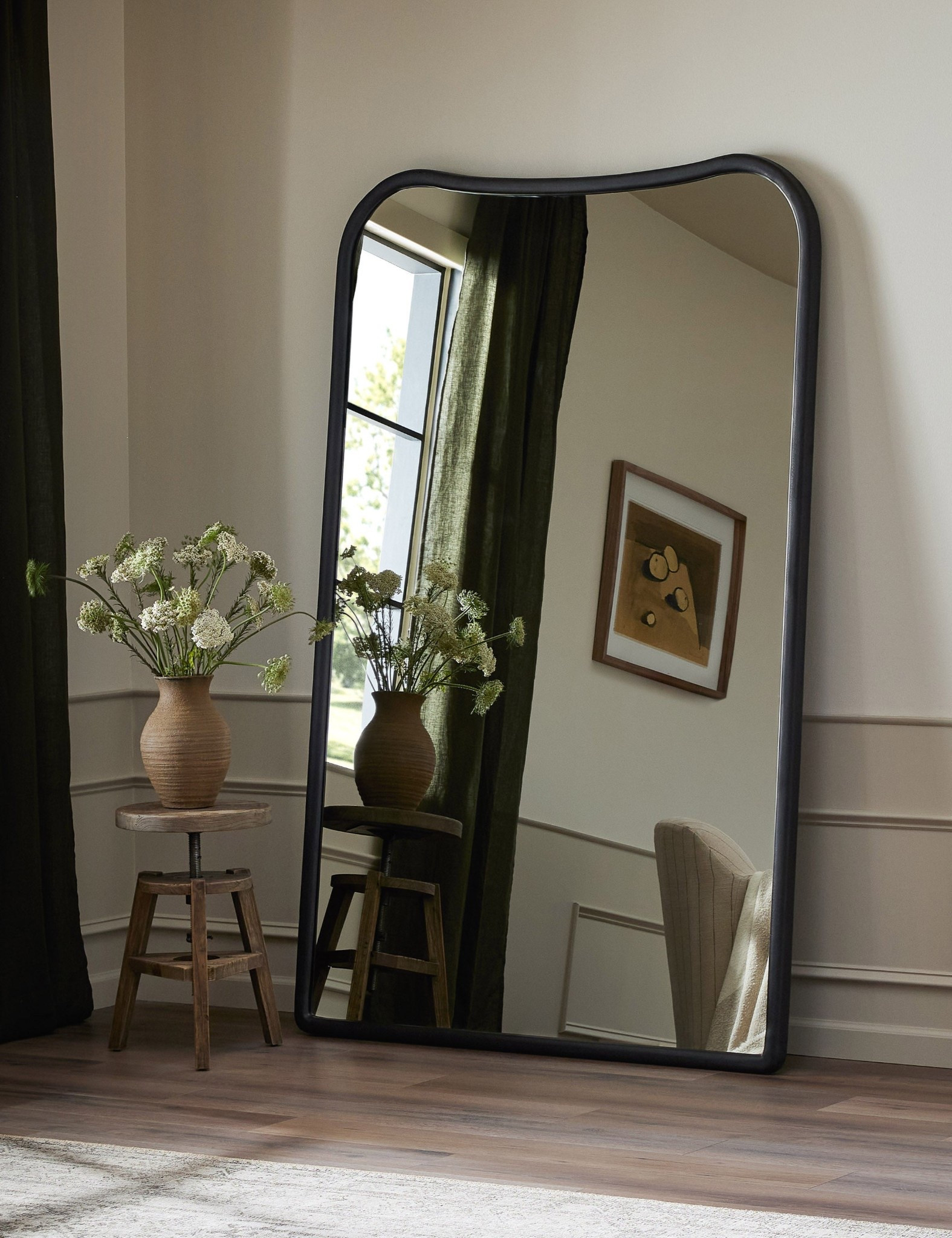 Floor mirror , A curvilinear shape with a black metal frame brings a bold sophistication to the Patz mirror. This floor mirror is the perfect way to finish a transitional design with a modern edge.

#LTKHome
